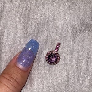Sterling silver and purple pendant